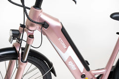 GIO STORM ELECTRIC BIKE ROSE GOLD WITH INTEGRATED SAMSUNG BATTERY